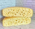 Сыр Эмменталь классический полутвердый 100010